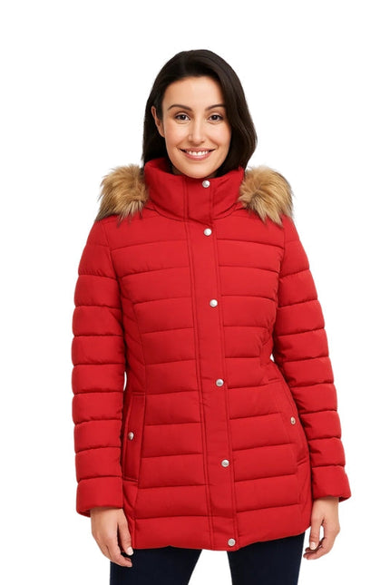 Woman wearing a red puffer jacket with fur trim on a white background