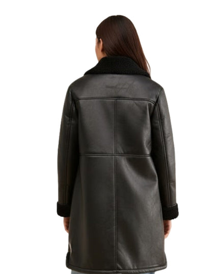 Person wearing a black leather coat on a white background