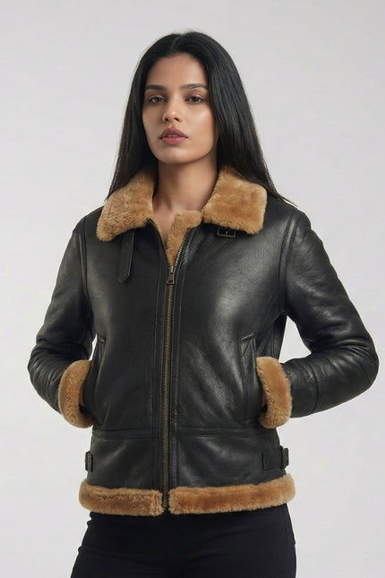 Woman wearing a black leather jacket with brown fur trim on a white background