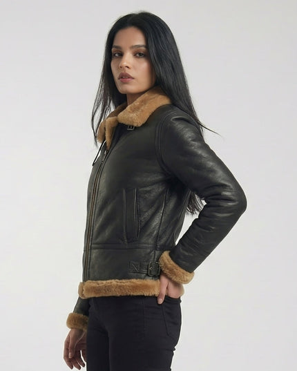 Woman wearing a black leather jacket with brown fur trim on a white background
