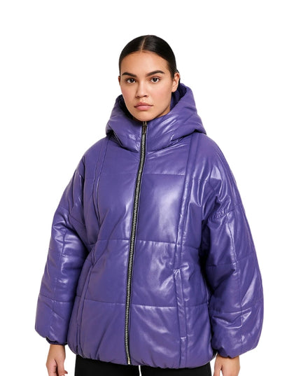 Woman wearing a purple puffer jacket on a white background