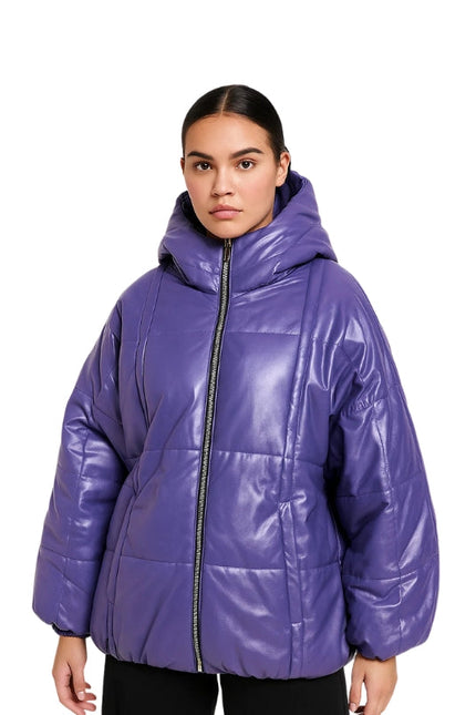 Woman wearing a purple puffer jacket on a white background