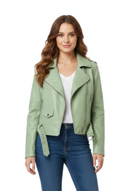 Woman wearing a green leather jacket and blue jeans on a white background