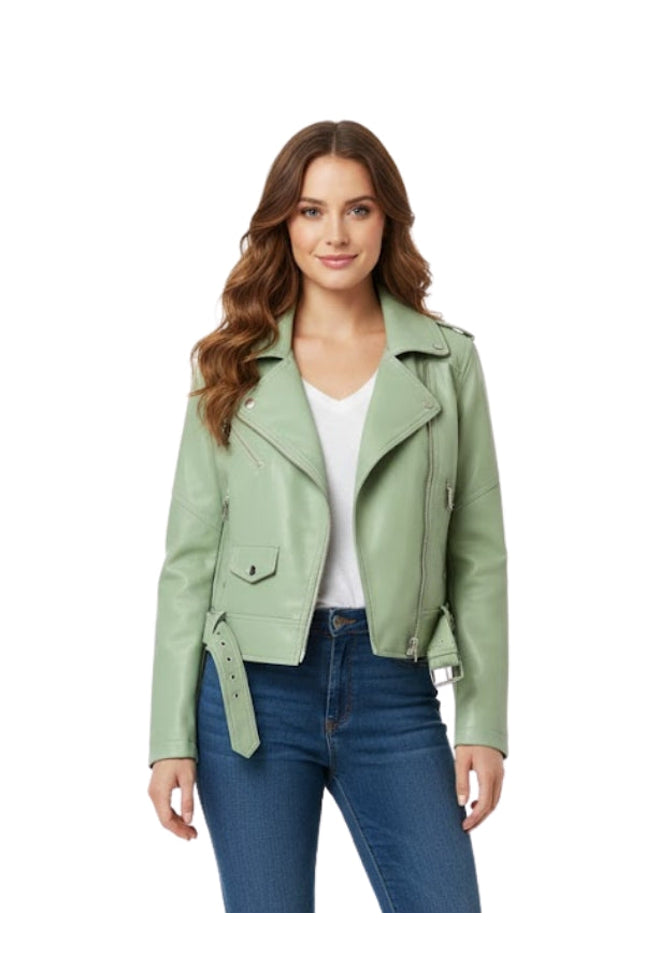 Woman wearing a green leather jacket and blue jeans on a white background