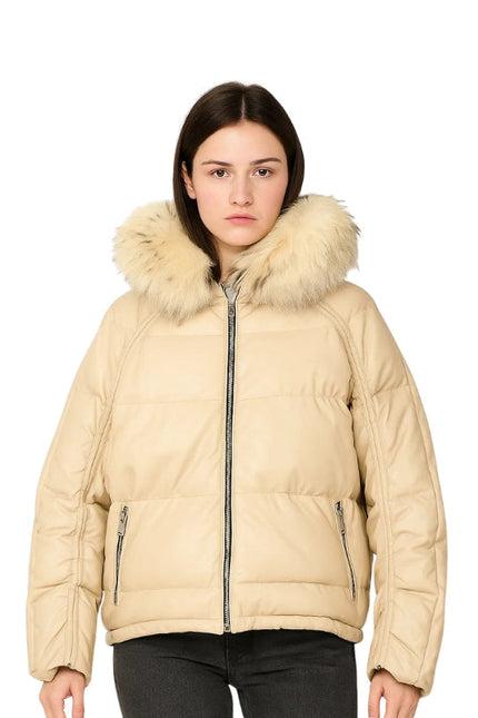 Woman wearing a beige puffer jacket with fur hood on a white background
