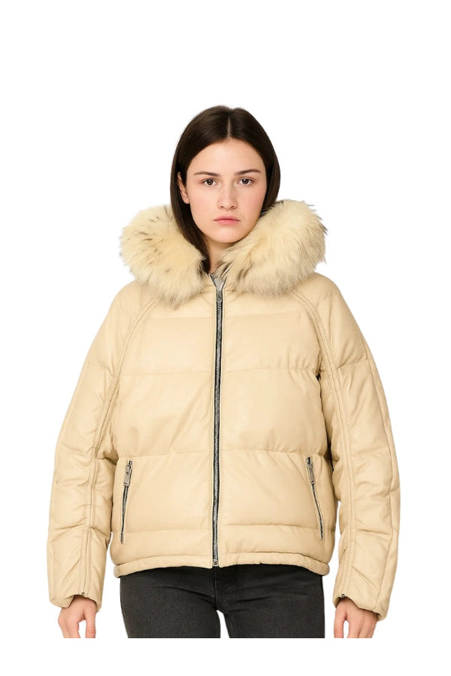 Woman wearing a beige puffer jacket with fur hood on a white background