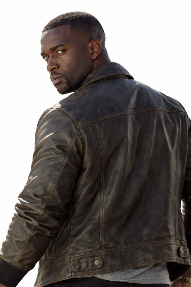Man wearing a dark leather jacket on a white background