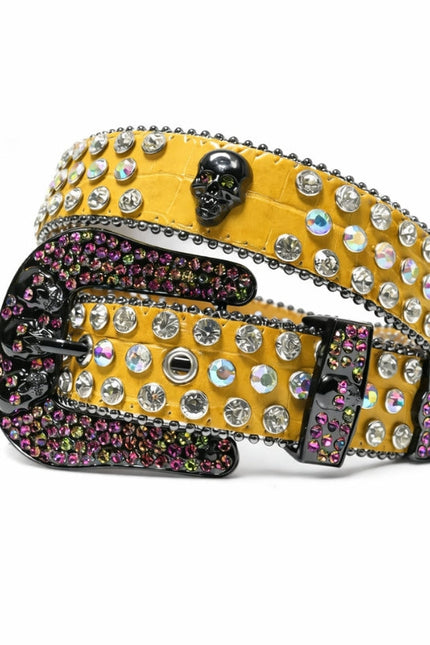 Decorative belt with rhinestones and skull design on a white background