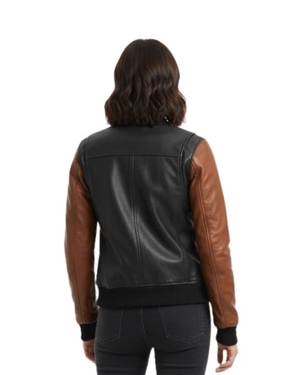 Black and brown leather jacket worn by a person on a white background