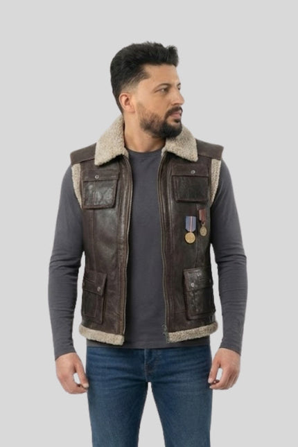Man wearing a brown leather vest with fur lining on a gray background