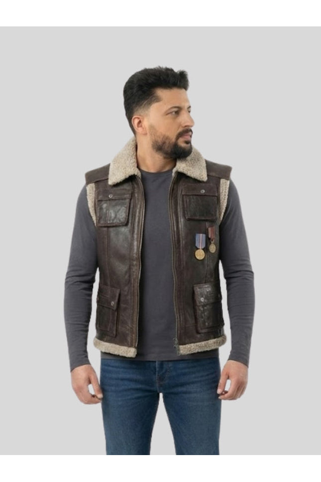 Man wearing a brown leather vest with fur lining on a gray background