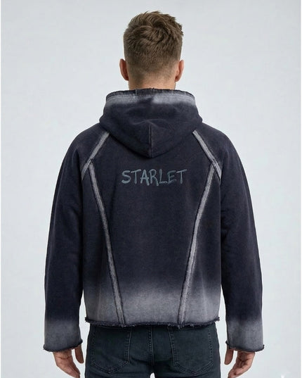 Person wearing a black and gray gradient jacket with 'STARLET' branding on the back against a light gray background.